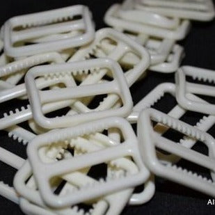 Slider / adjuster 26mm with Teeth - White Dyeable Plastic - 10 pcs - Allied Trimmings Inc